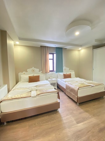 Standard Triple Room | Premium bedding, minibar, free WiFi, bed sheets