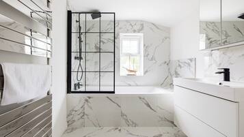 Three Bedroom House | Bathroom | Bathtub, hair dryer, heated floors, towels