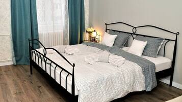 Apartment, 1 King Bed | 1 bedroom, iron/ironing board, free WiFi, bed sheets