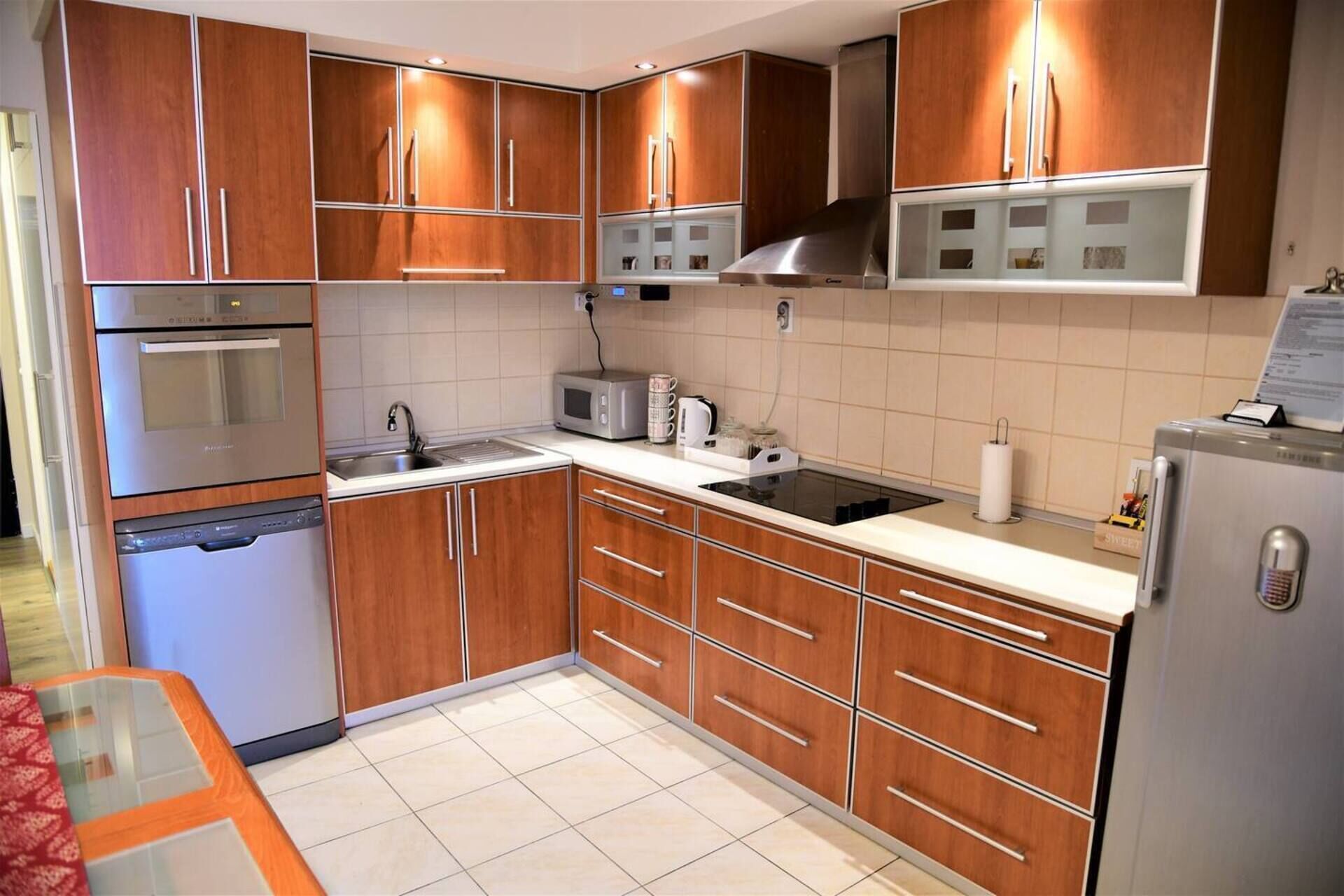 Apartment, 1 King Bed | Private kitchen | Fridge, microwave, oven, stovetop
