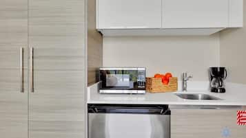 Microwave, coffee/tea maker, toaster, cookware/dishes/utensils