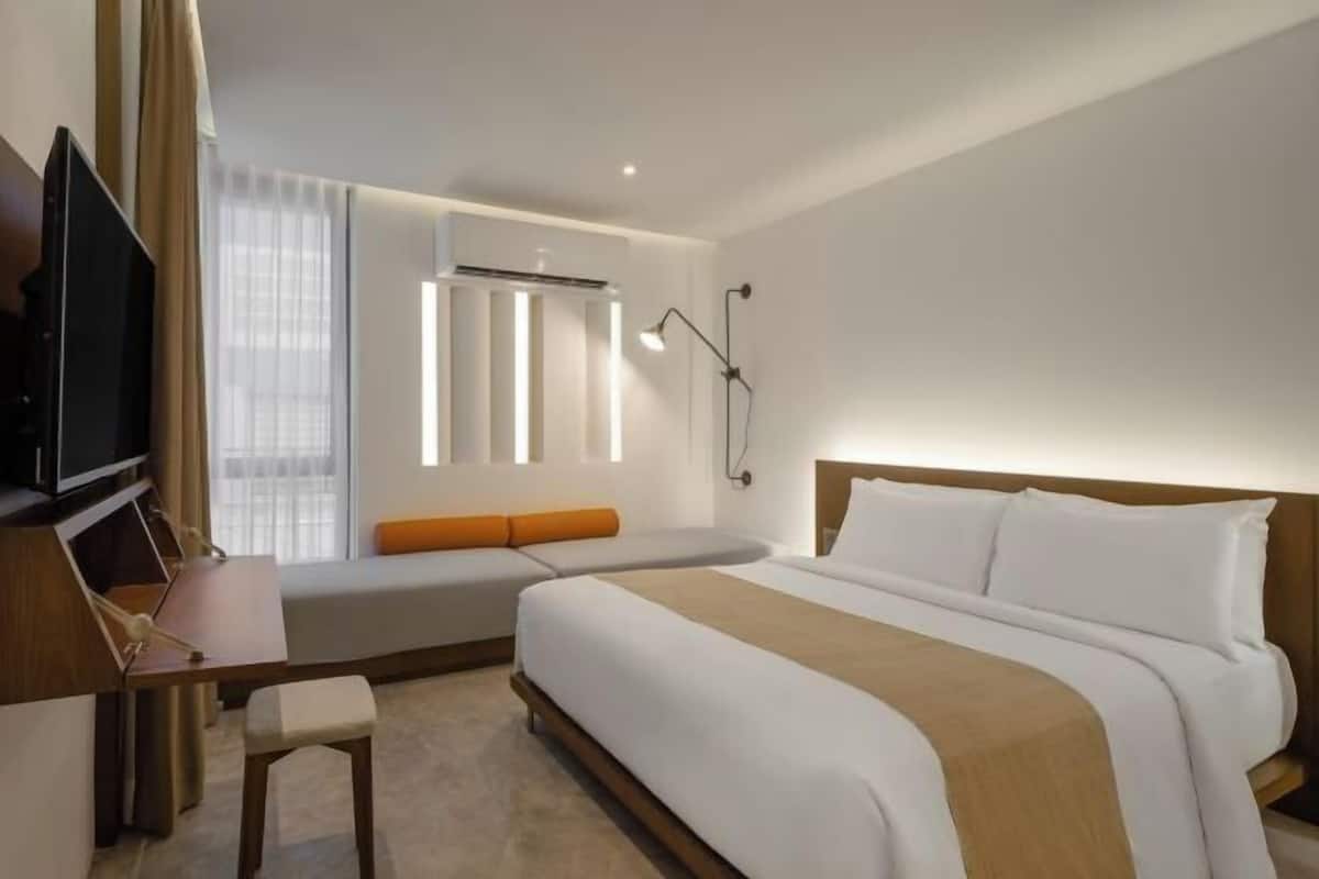 Camas com colchões pillow-top, frigobar, cofres nos quartos