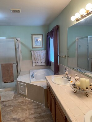 Combined shower/tub, towels, soap, toilet paper - Home away from Home (Federal Way)
