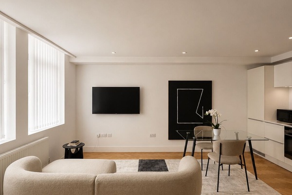 A beautifully designed and comfortable living area featuring a plush sofa and Netflix access — the perfect space to relax, unwind, and enjoy your favourite shows.