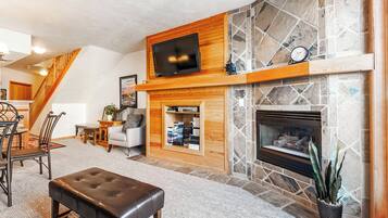 Smart TV, fireplace, DVD player, books