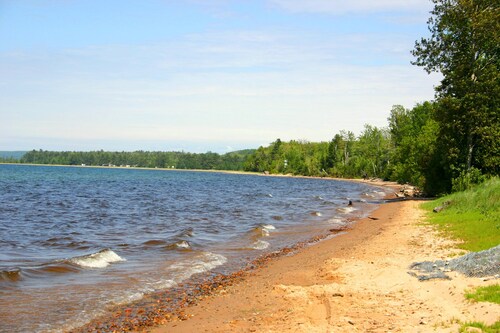 On the shore of Lake Superior with a beach in Christmas - near Munising
