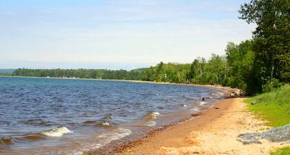 On the shore of Lake Superior with a beach in Christmas - near Munising