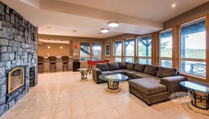 Smart TV, fireplace, table football, books