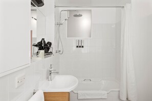 Combined shower/bathtub, hair dryer, towels, soap - Modern Luxurious Living With Your Own Parking Spot (Sandy Bay)