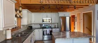 Log Cabin style lake house on Sea Lion Lake