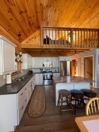 Log Cabin style lake house on Sea Lion Lake