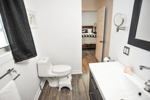 Combined shower/tub, jetted tub, hair dryer, slippers - Modern Rustic Home with WoodStove & Pool Table (Kemble)