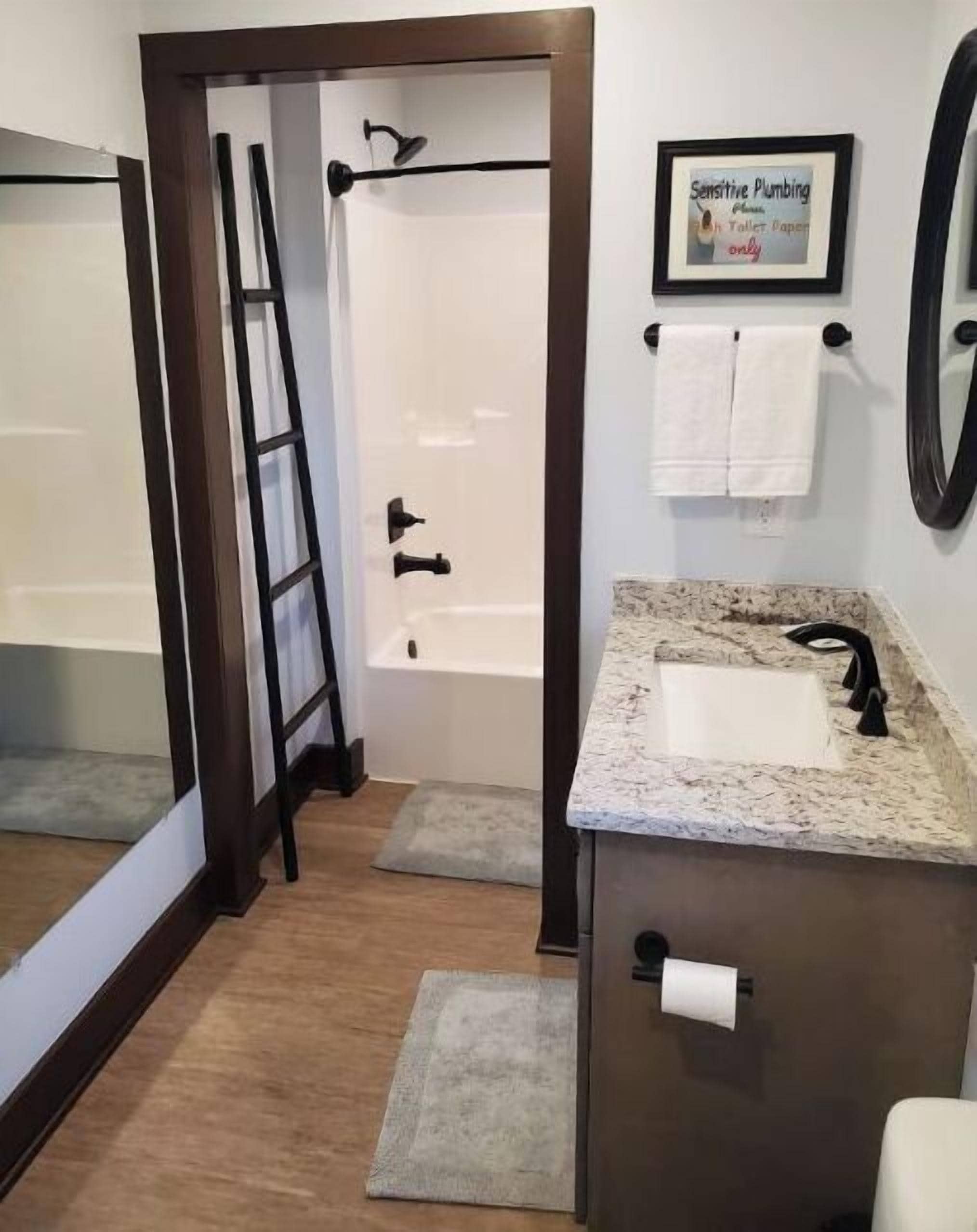 Combined shower/tub, hair dryer, towels, toilet paper