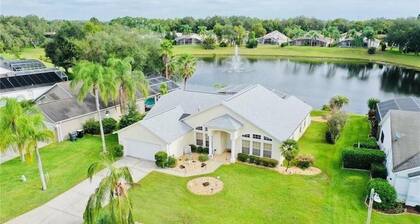 Beautiful waterfront home with heated pool and game room.