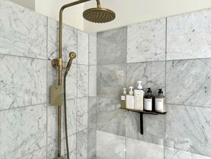 Shower, hair dryer, towels, soap