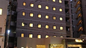 A multi-story hotel with a central entrance, a flat roof, and a series of windows on each floor. - Hotel Fukuya (Takamatsu)