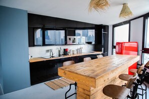 Fridge, microwave, stovetop, coffee/tea maker