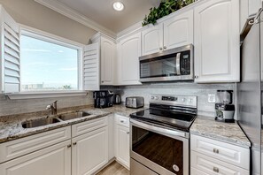 Fridge, microwave, oven, stovetop - Beachfront Corner Condo with Free WiFi, Furnished Balcony, & a Shared Pool (Orange Beach)