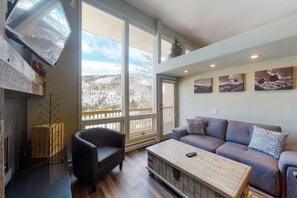 TV, fireplace - Remodeled Condo Overlooking the Mountains - Fireplace, Washer/Dryer & Free WiFi (Vail)