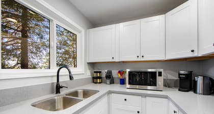 Colorful home with washer/dryer, AC & wood-burning fireplace in a lovely setting