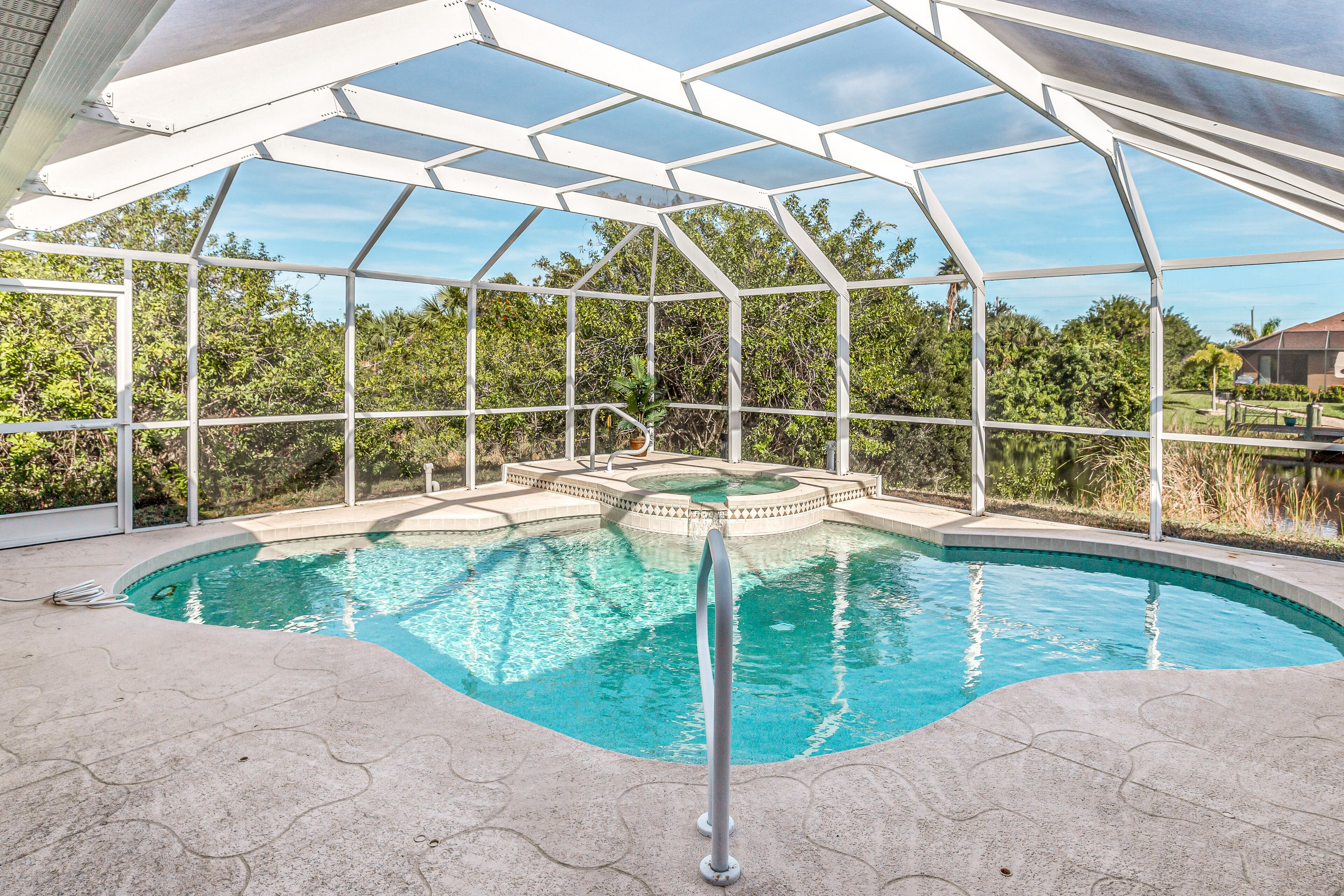 Dog-friendly home with private heated pool, grill, A/C, & washer/dryer