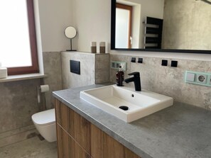 Bathtub, hair dryer, towels