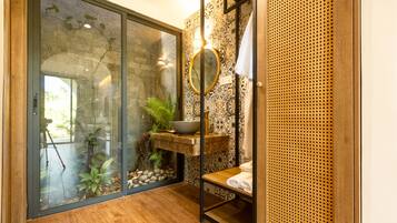Design Suite, 1 King Bed, Patio, Garden View | Minibar, individually decorated, individually furnished, desk