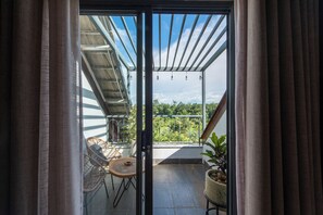 Design Double Room, 1 King Bed, Balcony, Lake View | Minibar, individually decorated, individually furnished, desk