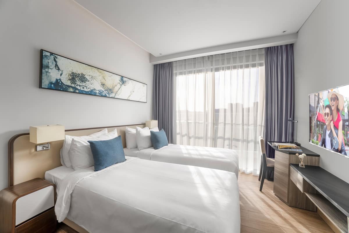 2 bedrooms, in-room safe, individually decorated, desk