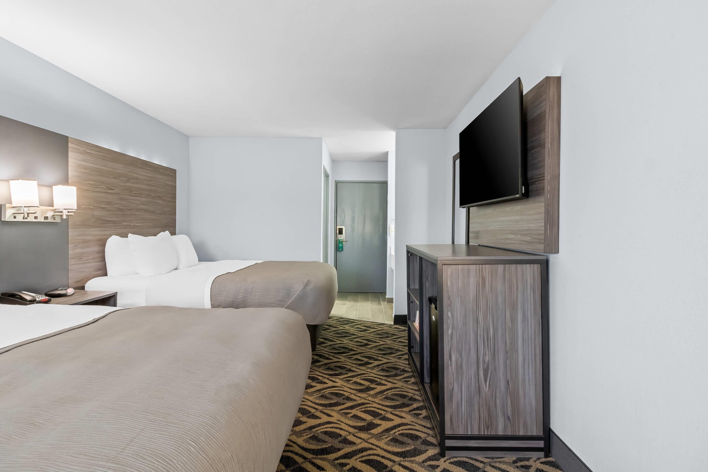 Standard Room, 2 Queen Beds, Non Smoking | In-room safe, blackout drapes, soundproofing, iron/ironing board