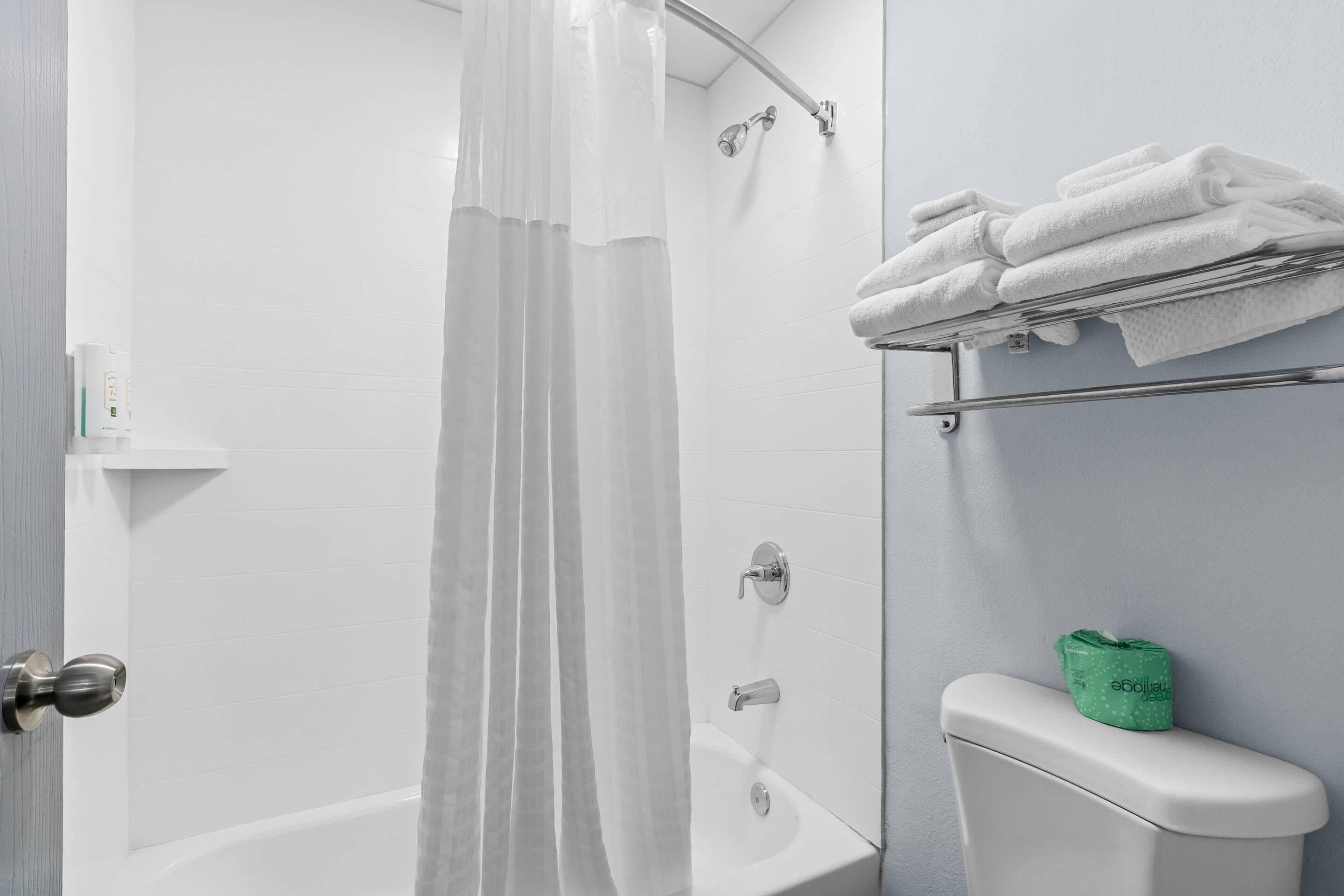 Standard Room, 2 Queen Beds, Non Smoking | In-room safe, blackout drapes, soundproofing, iron/ironing board