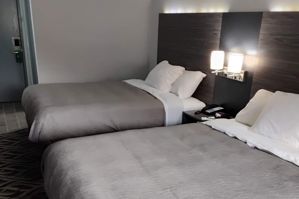 Standard Room, 2 Queen Beds, Non Smoking | In-room safe, blackout curtains, soundproofing, iron/ironing board