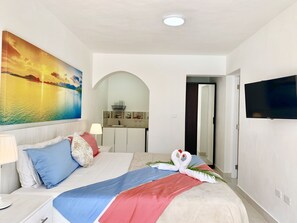 Vila família, 6 quartos, vista para o jardim, ao lado da piscina | 6 quartos, cofres nos quartos, Wi-Fi de cortesia, roupa de cama