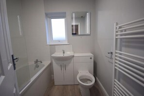 Combined shower/bathtub