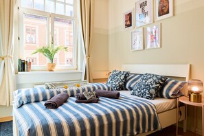 2 slaapkamers, een strijkplank/strijkijzer, reisbedje, gratis wifi