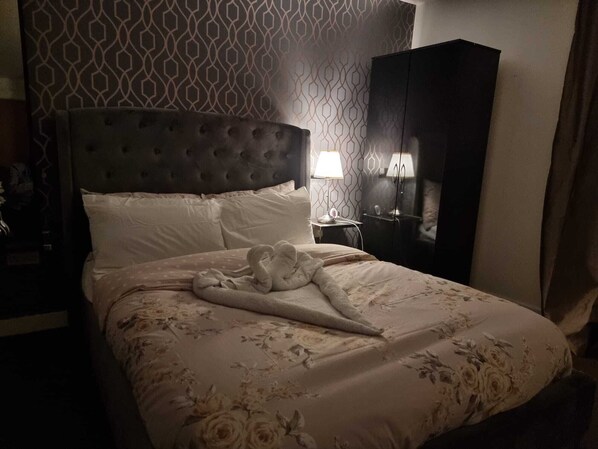 Appartement, 2 grands lits | 2 chambres, fer et planche à repasser, Wi-Fi gratuit, draps fournis