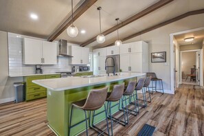 Fridge, microwave, oven, stovetop - 4BR Home with Hot Tub, Grill & Game Lounge | USAFA (Colorado Springs)