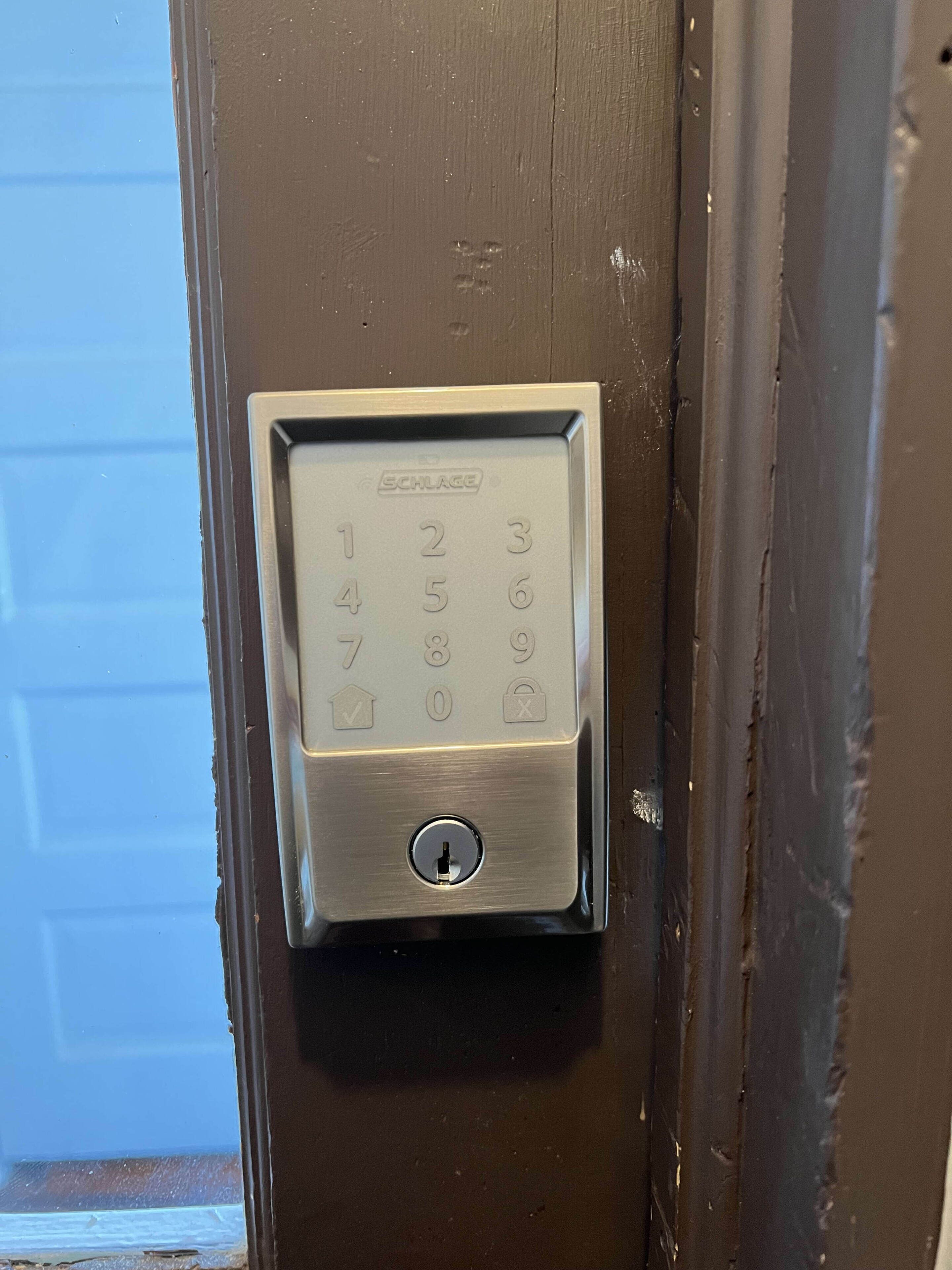 A door with a numeric keypad lock.