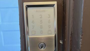 A door with a numeric keypad lock.