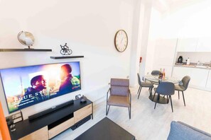 Appartement, plusieurs lits | Coin séjour