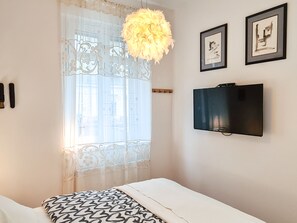 1 chambre, coffres-forts dans les chambres, fer et planche à repasser