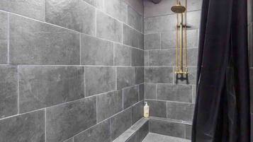 Shower, towels, soap, toilet paper