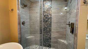 Bathtub, hair dryer, towels, soap