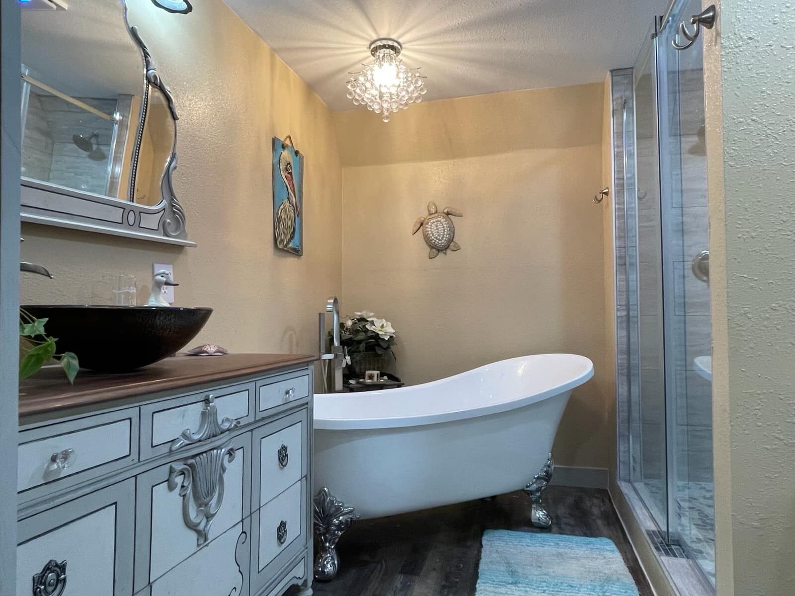 Bathtub, hair dryer, towels, soap