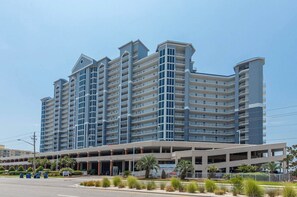 Guests can enjoy outdoor space from each floor's balconies and convenient parking access.