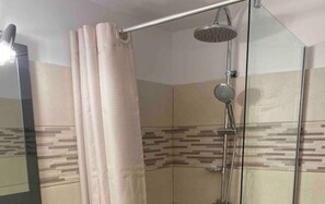 Shower, towels, soap, toilet paper