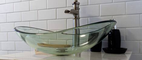 Shower, hair dryer, towels, toilet paper