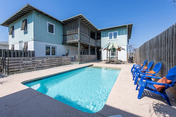 Shared pool at Higher Calling with pergola and seating