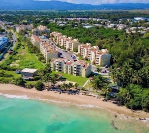 On the beach, sun loungers, beach towels