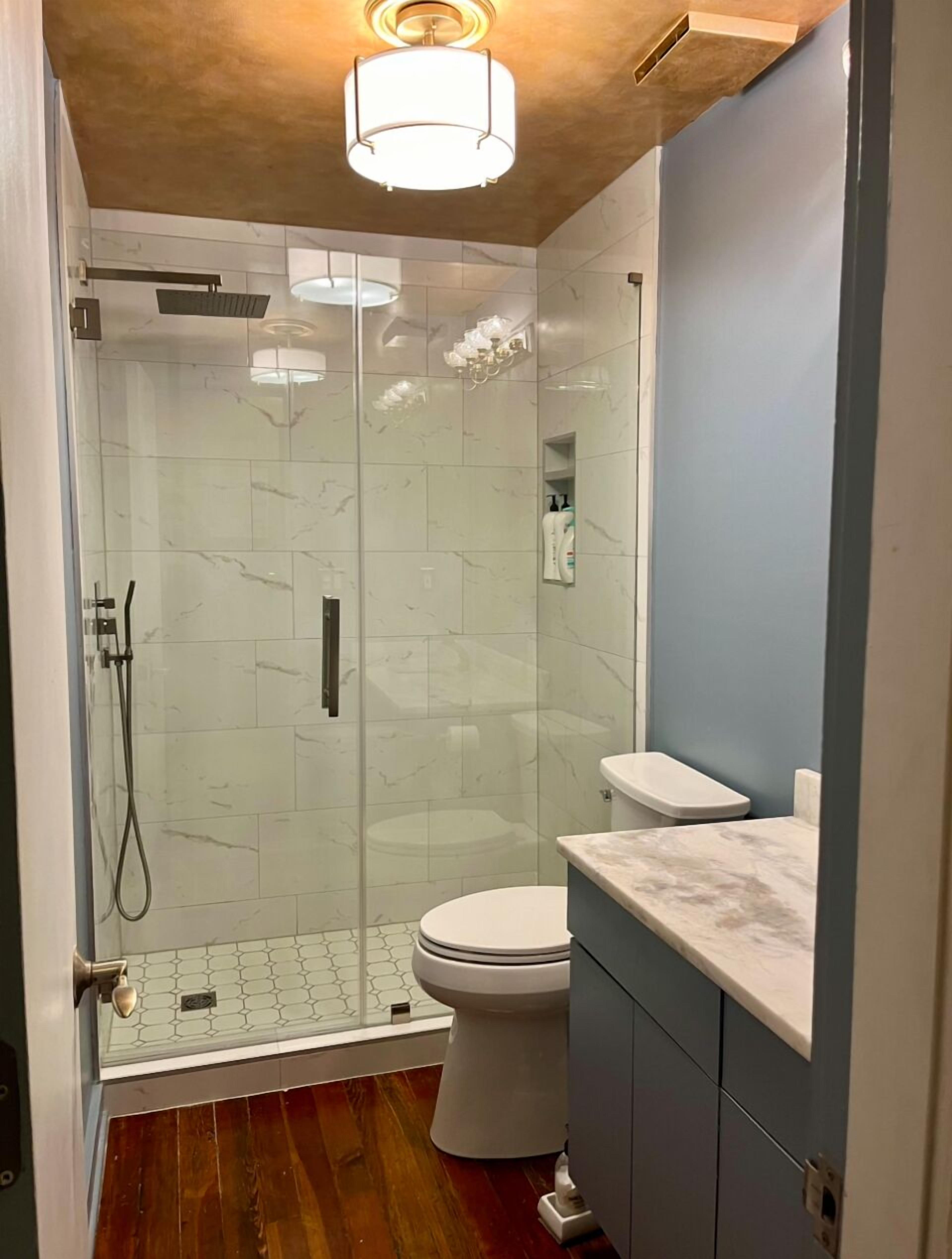Combined shower/tub, hair dryer, towels, soap